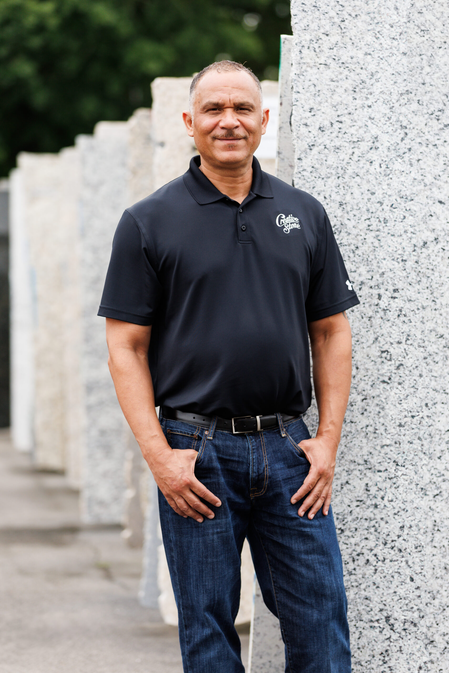 Richard Johnson, owner of the Fayetteville Granit and Countertop Company, poses for a portrait as his day beins on Wednesday, May 15, 2024. Photo: Tony Wooten